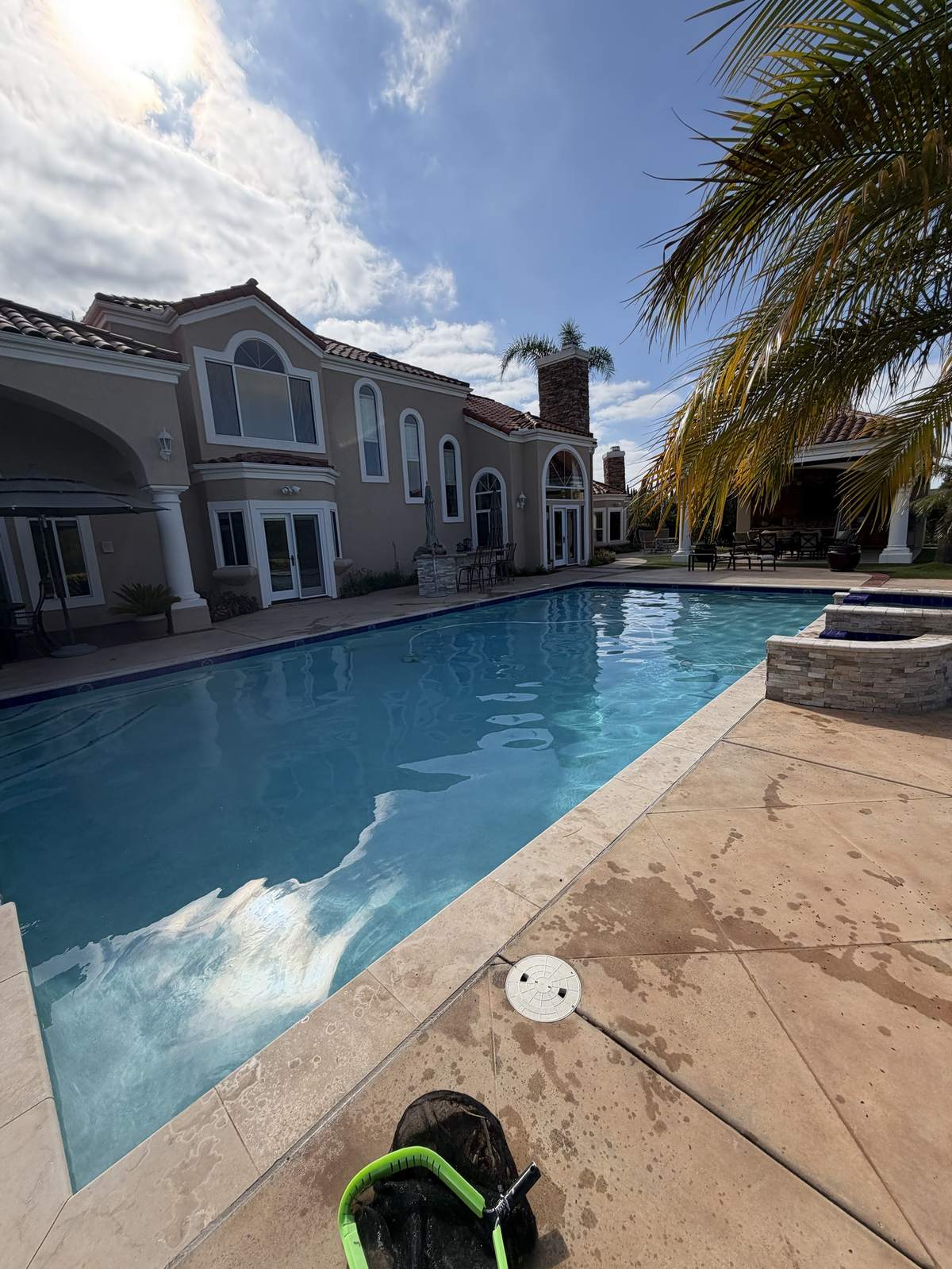Residential backyard pool serviced by Fairwater Pools